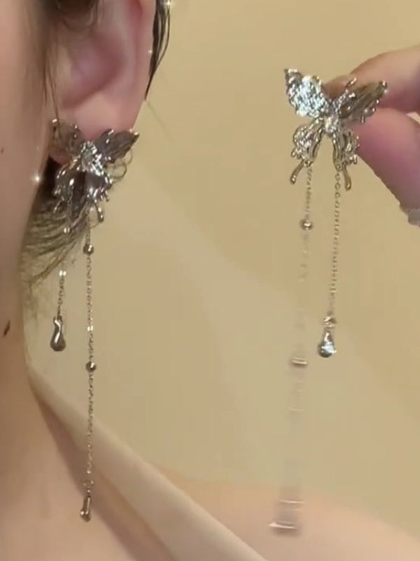 Silver Y2k earrings with butterfly pendant and tassel