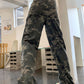 Green camouflage cargo jeans with a wash effect