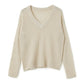 White vintage cut out knitted sweater with loose fit and V neck