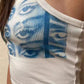 White crop tank top with Staring Eye graphic