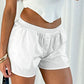 White retro button shorts