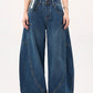 Vintage blue boyfriend jeans with large pockets and wide curved cut