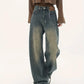 Vintage distressed baggy boyfriend jeans with cut pockets