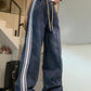 Faded boyfriend jeans with splice piping and drawstring