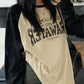 Oversized raglan long sleeve T-shirt with printed slogan