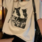 Vintage oversize T-shirt with short sleeves and cat print