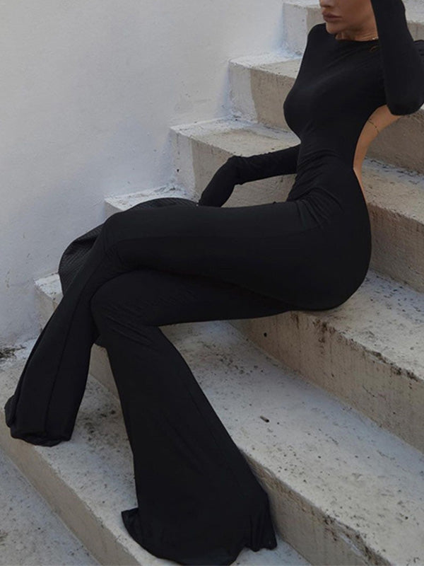 Black vintage jumpsuit with long sleeves and flared legs