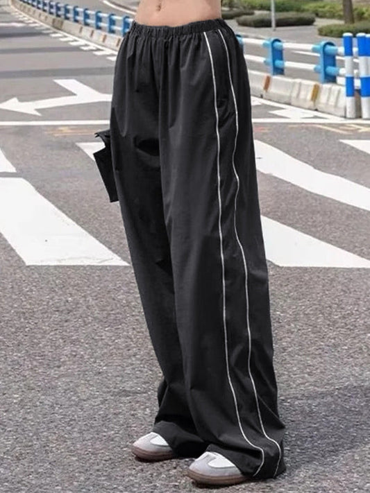 Black baggy sweatpants with piping detail