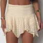 Cute structured pleated mini skirt with irregular mushroom hem and high waist