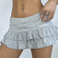 Flangeder mini skirt with low waist embroidered letters and ruffles