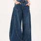 Vintage blue boyfriend jeans with large pockets and wide curved cut