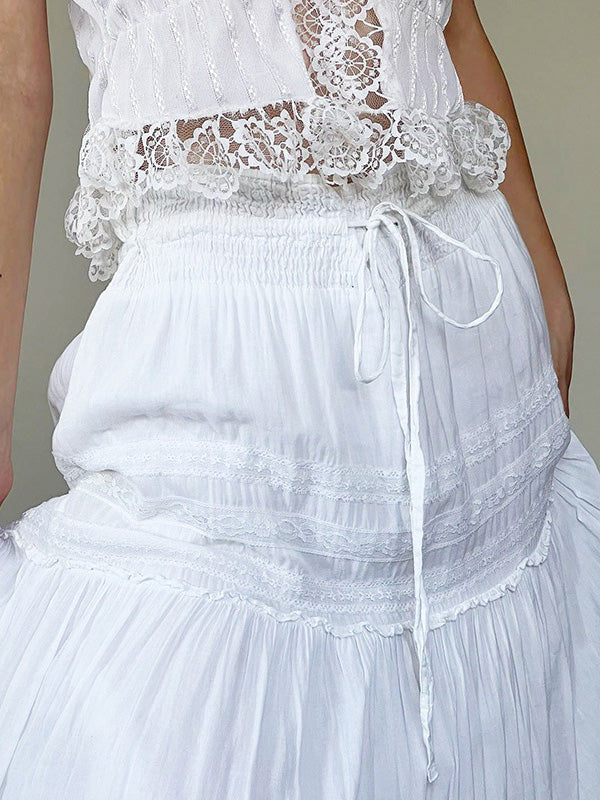 White vintage maxi skirts with lace trim and straps