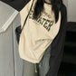 Oversized raglan long sleeve T-shirt with printed slogan