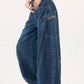 Vintage blue boyfriend jeans with large pockets and wide curved cut