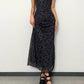 Black vintage maxi dress with generous neckline and slim fit