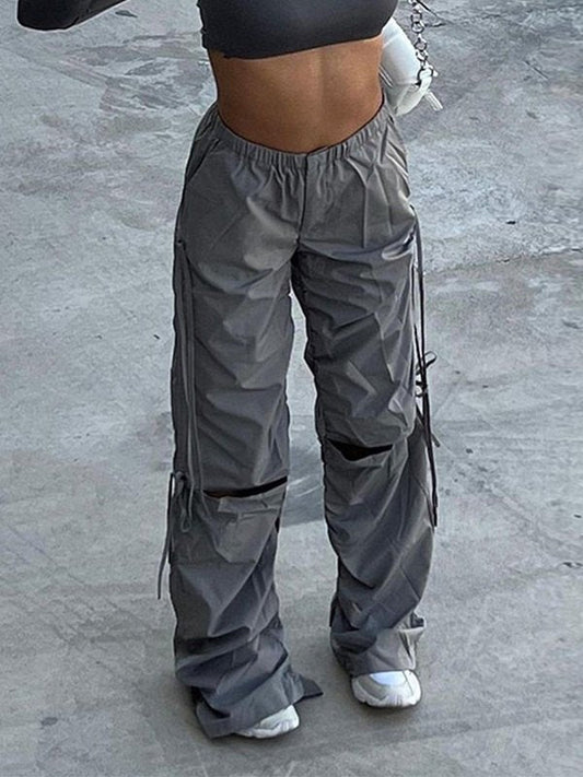 Vintage cargo pants with cutouts and tie belt