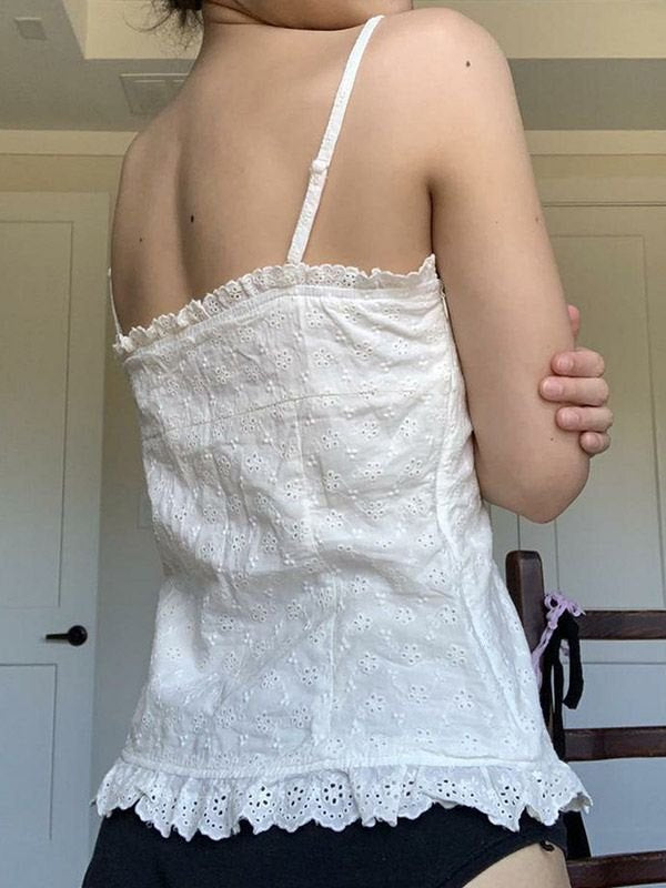 White vintage camisole with buttons and embroidered lace