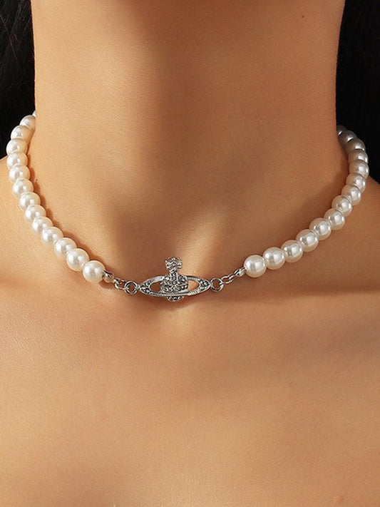 Vintage faux pearl necklace with planet detail