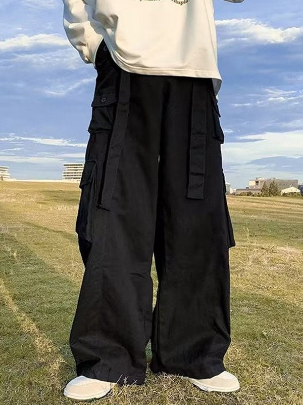 Men's baggy cargo pants with strap detail and pocket