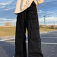 Men's baggy cargo pants with strap detail and pocket