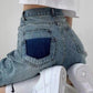 Knee-length denim shorts with raw hem