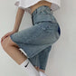 Knee-length denim shorts with raw hem