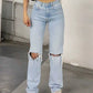 Light blue 2000s Y2k boyfriend jeans with ripped design