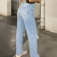 Light blue 2000s Y2k boyfriend jeans with ripped design