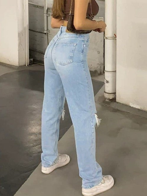 Light blue 2000s Y2k boyfriend jeans with ripped design