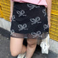 Black Y2K bow pattern mesh mini skirt