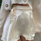 White vintage satin mini skirt with lacing