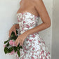 Cute strapless mini dress with a floral pattern