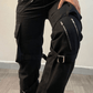 Black hip hop zip up cargo pants with strap details