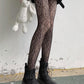 Fishnet tights with a spider web pattern