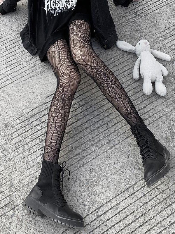 Fishnet tights with a spider web pattern