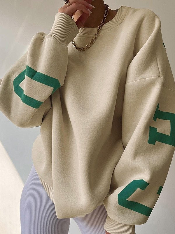 Oversized varsity sweatshirt with green letter graphic