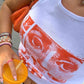 White crop tank top with Staring Eye graphic